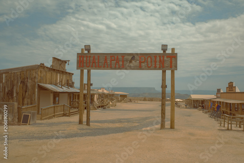 Western ghost town entrance in the desert