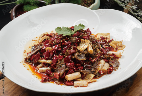 Double Crispy Duck Gizzard and Lotus Root Served on a Peach-Shaped White Porcelain Plate