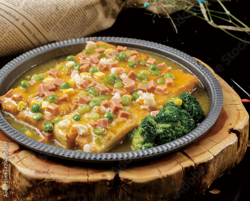 Delicious sizzling tofu served on a hot plate