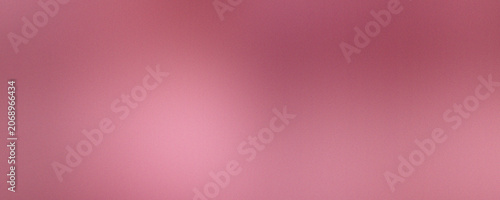 Dusty rose abstract gradient background with fine grain texture