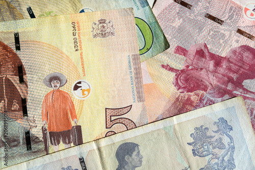 Foto Group of Georgian paper currency gel cash bills background closeup