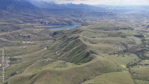 Aerial View South Africa Reservoir Under Brewing Storm Clouds Dramatic Overcast Sky Rolling Mountain Ridges