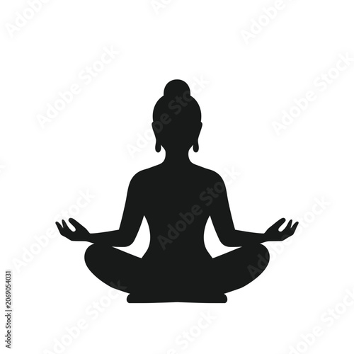 Фотография Meditator sits in a classic lotus position demonstrating balance and deep inner spiritual peace