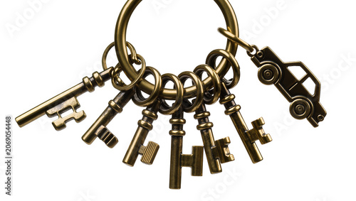 Canvastavla Antique brass keys and car charm on a ring, isolated on transparent background