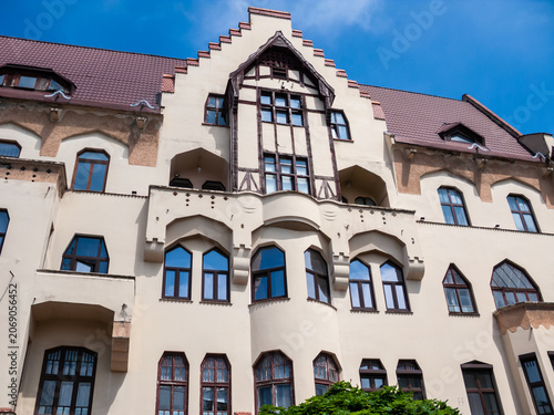 Chernivtsi buildings show unique architecture and design in urban setting under clear skies