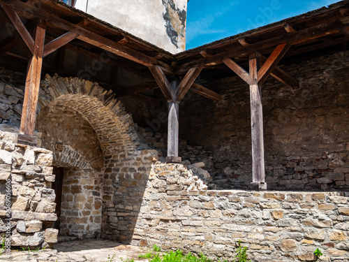 Exploring the ancient stone walls of Khotyn castle in Ukraine during daylight hours