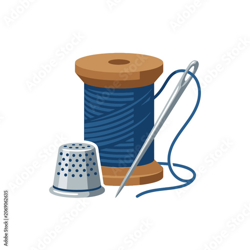 Foto This sewing kit includes thread, spool, needle and thimble