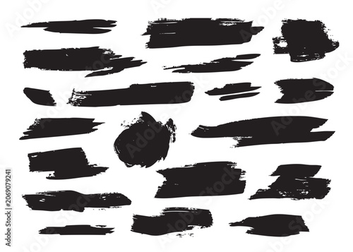Black grunge brush strokes collection isolated on white background. Ink paint smears, rough textures and abstract shapes for banners, frames, overlays and modern design elements