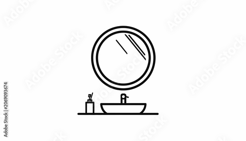Bathroom sink with round mirror.