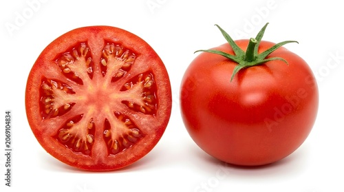 A ripe red tomato, whole and halved, showcases its juicy interior with visible seeds and flesh