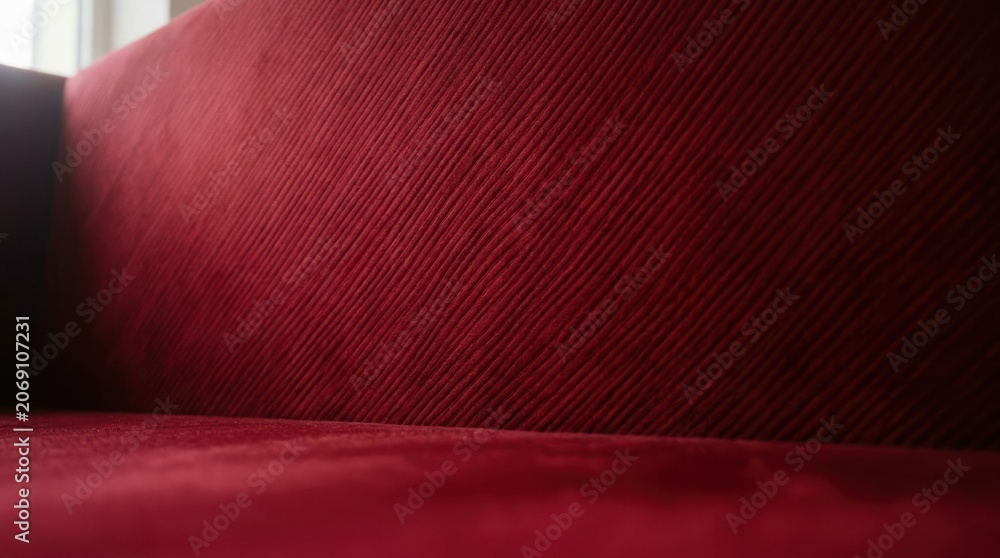 Obraz premium Closeup of a Textured Red Fabric Surface.