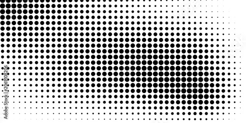Photos A black and white photo of a patterned fabric with many small dots