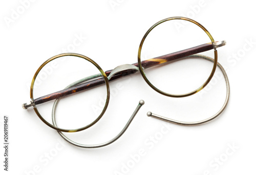 Vintage circular eyeglasses on a white background