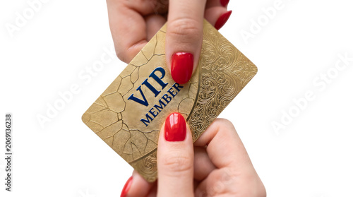 Closeup of a womans hands holding a gold vip member card isolated on transparent background