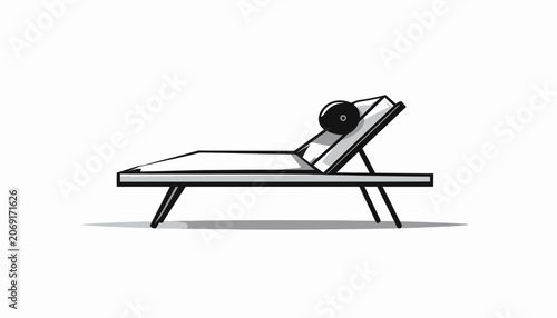 Fotografia A single outdoor chaise lounge chair.