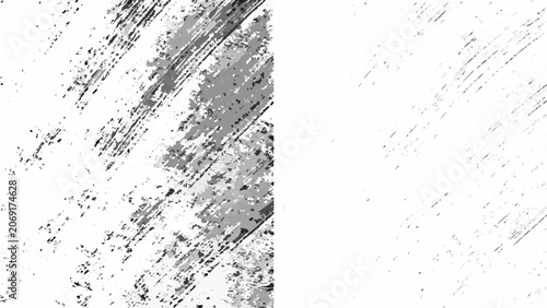 Фотография Black and white grunge texture with distressed brushstrokes and scattered speckl