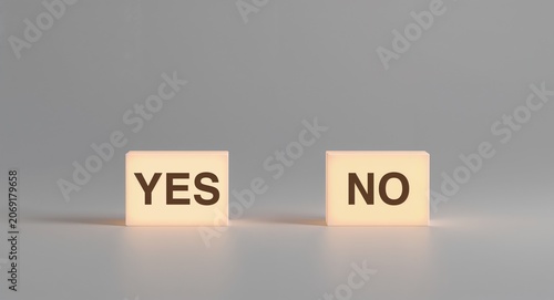 In a decision-making scenario, luminous 'Yes' and 'No' blocks rest against a � Professional Stock Photography Concept for Commercial and Marketing Use