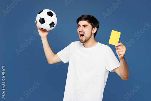 Foto Young angry sad man fan wear white t-shirt cheer up support football sport team