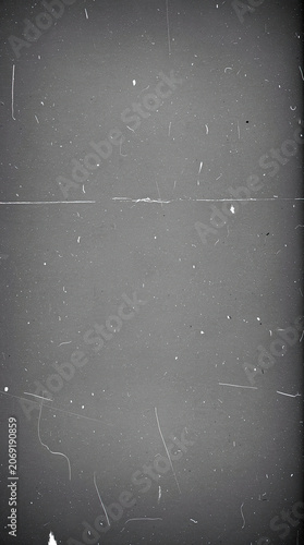Vintage film grain overlay texture with authentic dust and scratches.