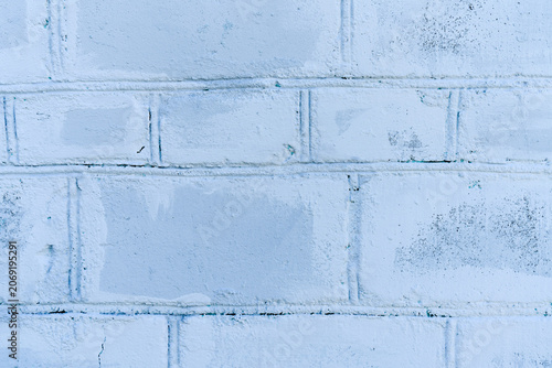 Billede på lærred The texture of a painted brick wall