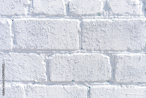 Billede på lærred The texture of a painted brick wall