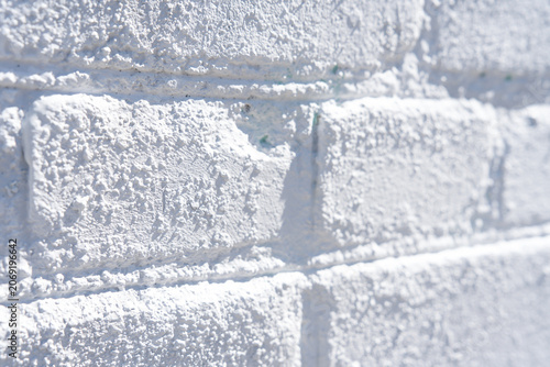 Fotografija The texture of a painted brick wall