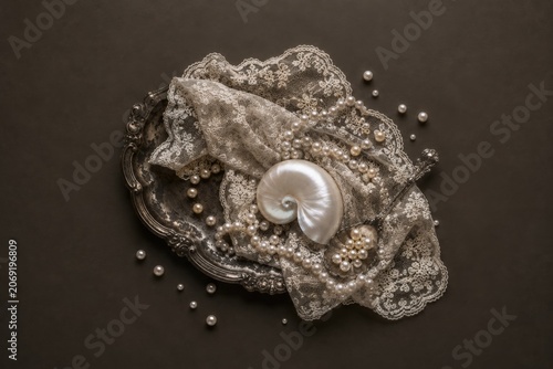 Pearl And Shell Still Life With Lace Fabric On Dark Background
