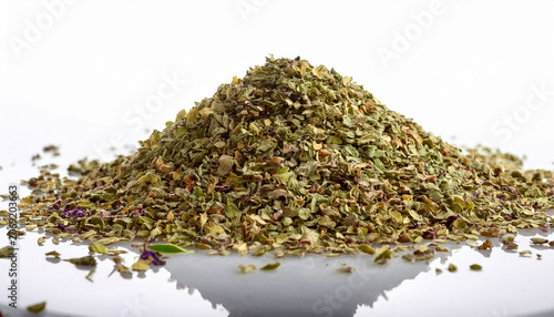 Dried Oregano Forming A Small Mound On White Background