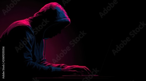 Mysterious Figure in Hoodie Working on Laptop in Dark Environment