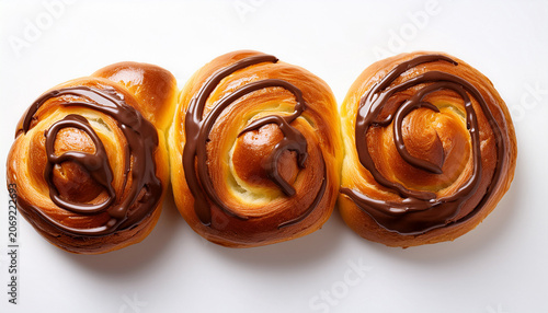 Brioche Rolls With Chocolate On A White Background Shot From Above