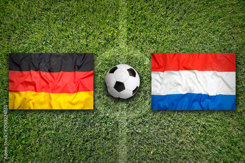 Germany vs. Netherlands flags on soccer field