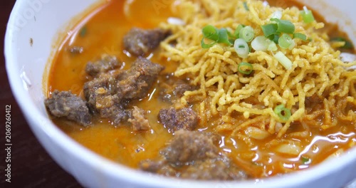 Close up of northern Thai beef khao soi noodle curry soup