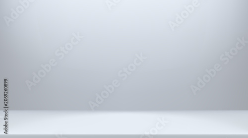 Fotografia Clean grey abstract limbo setting featuring silver gradient walls, soft illumination on empty stage