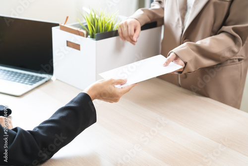 Obraz na plátně Unemployment quitting job, desperate asian young business woman send resignation