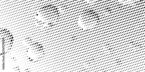 Foto Abstract halftone background with wavy surface made of gray dots on white