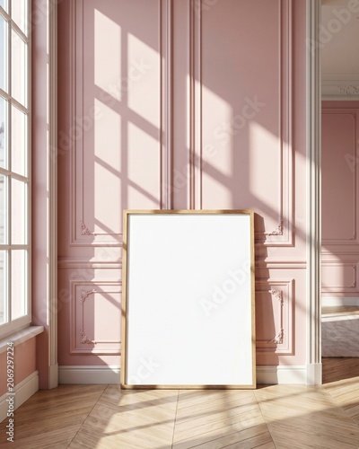 Blank wood frame mockup leaning against pink paneled wall with sunlight shadows