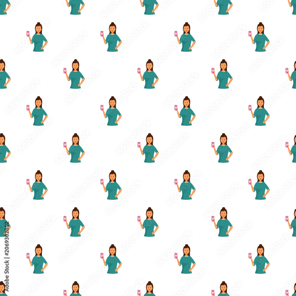 Fototapeta premium Young woman standing and showing a smartphone device in a seamless pattern