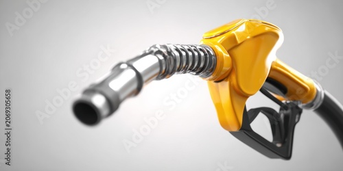 Close up of a yellow fuel nozzle against a neutral background concept for energy