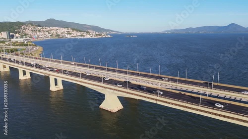 Aerial View of Pedro Ivo Campos and Colombo Salles Bridges with City Traffic and Ocean Coastline in Florianopolis Santa Catarina Brazil