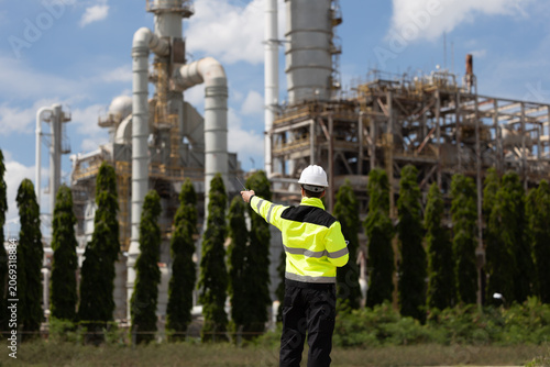 Petroleum engineer working at oil refinery site