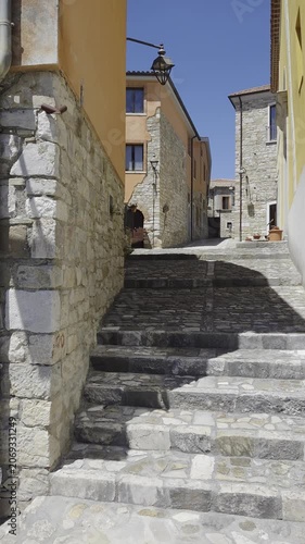 A street in an old village destroyed by an earthquake and now rebuilt in Molinara in Campania, Italy.