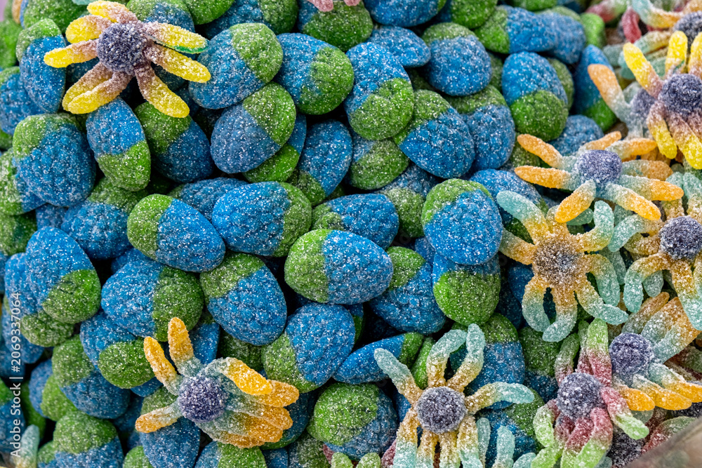 Fototapeta premium Fruit flavored jelly candies coated in a sour sugar mixture
