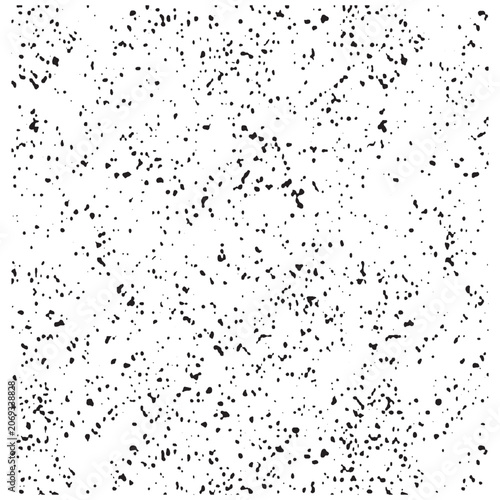 Grunge textured background with black speckles