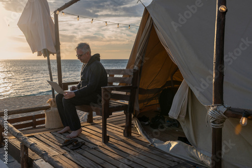 Fotografie Remote work from a sea view office