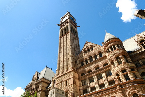 Foto Old City Hall Clock Tower Against Modern Glass Skyscrapers in Toronto — Historic