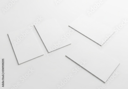 Four White Rectangular Cards on a White Background