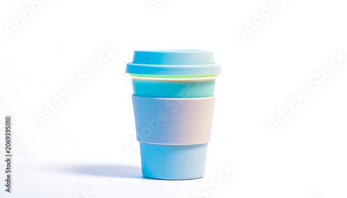 Isolated teal and white disposable coffee cup with light blue lid and cardboard sleeve, isolated on white