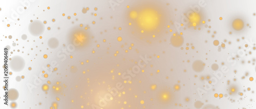 Golden bokeh lights and glowing particles on white background