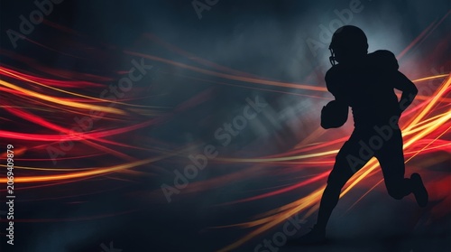 American football player silhouette running with ball on dynamic red and yellow streaks