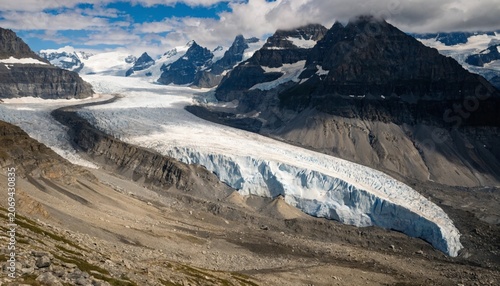 Obraz na plátně A breathtaking view of a receding glacier surrounded by jagged mountain peaks